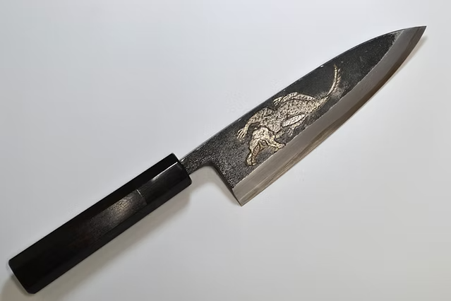 Sakai Takayuki Metal Decorated Engraving by Kubota Crocodile White Steel No.2 Black Finished Deba 165mm Ebony Wood (ferrule: Black Water Buffalo Horn And Silver Ring) Handle - Japanny - Best Japanese Knife