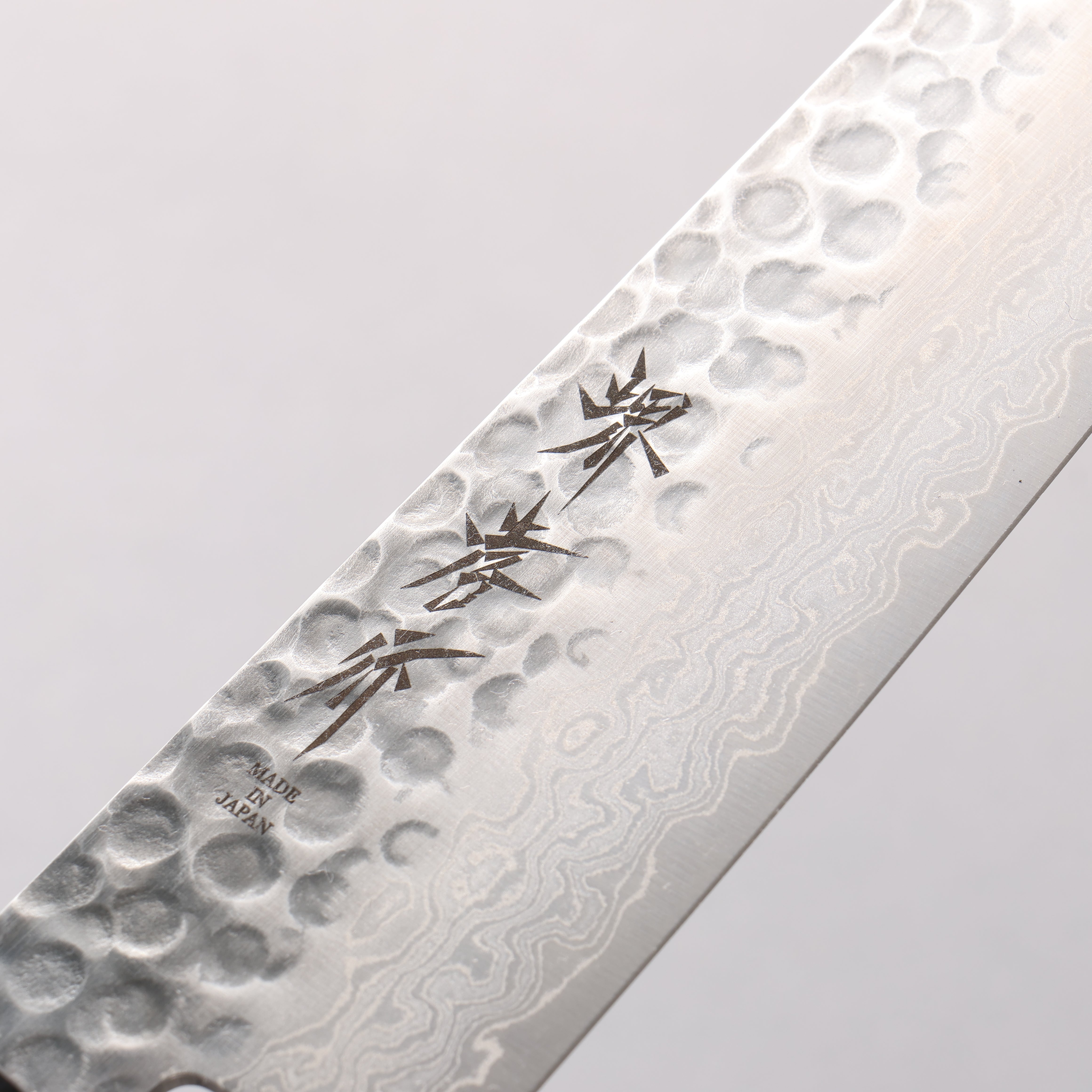 Sakai Takayuki AUS10 45 Layer Damascus Santoku 180mm Shitan Handle - Japanny - Best Japanese Knife