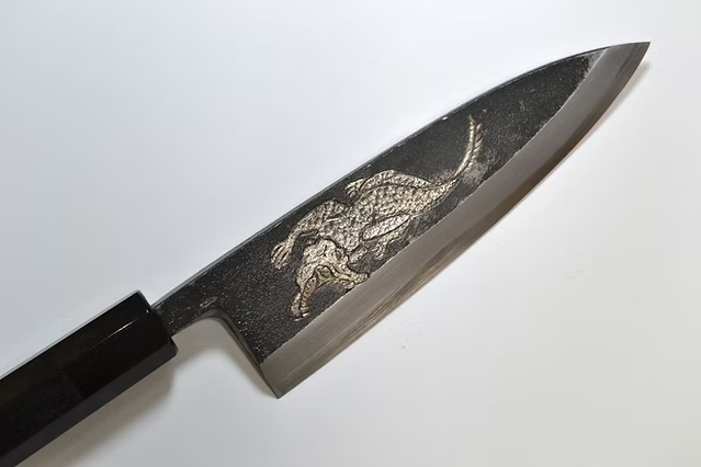 Sakai Takayuki Metal Decorated Engraving by Kubota Crocodile White Steel No.2 Black Finished Deba 165mm Ebony Wood (ferrule: Black Water Buffalo Horn And Silver Ring) Handle - Japanny - Best Japanese Knife