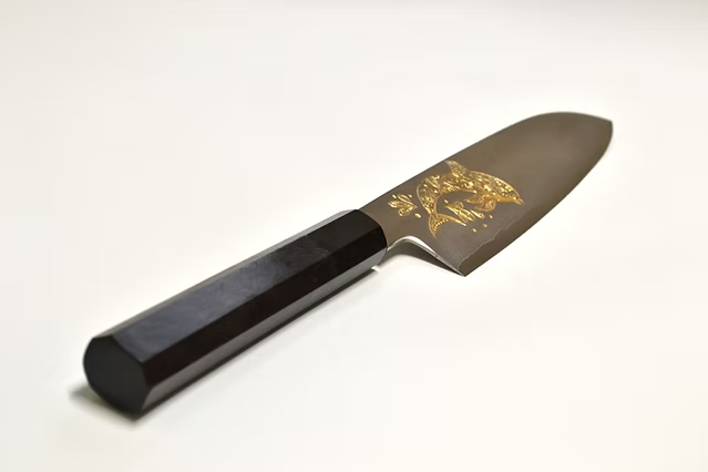 Sakai Takayuki Gold Filled Engraving by Kubota Dolphin Silver Steel No.3 Santoku 180mm Ebony Wood (ferrule: Black Water Buffalo Horn And Silver Ring) Handle - Japanny - Best Japanese Knife