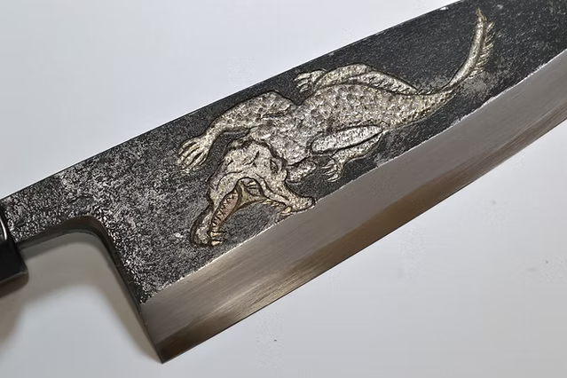 Sakai Takayuki Metal Decorated Engraving by Kubota Crocodile White Steel No.2 Black Finished Deba 165mm Ebony Wood (ferrule: Black Water Buffalo Horn And Silver Ring) Handle - Japanny - Best Japanese Knife